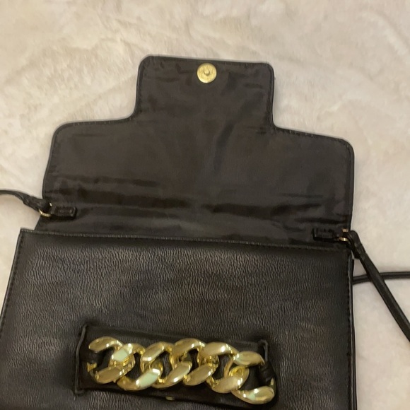 H & M black crossbody with bold gold chain front accent. - Picture 8 of 11